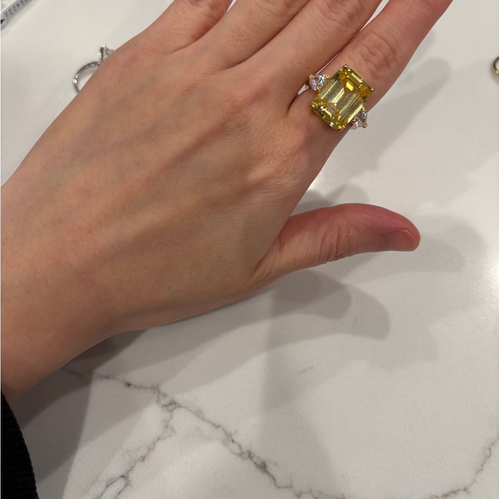 Costume Jewelry Ring - oversized yellow emerald cut stone and two hearts on side